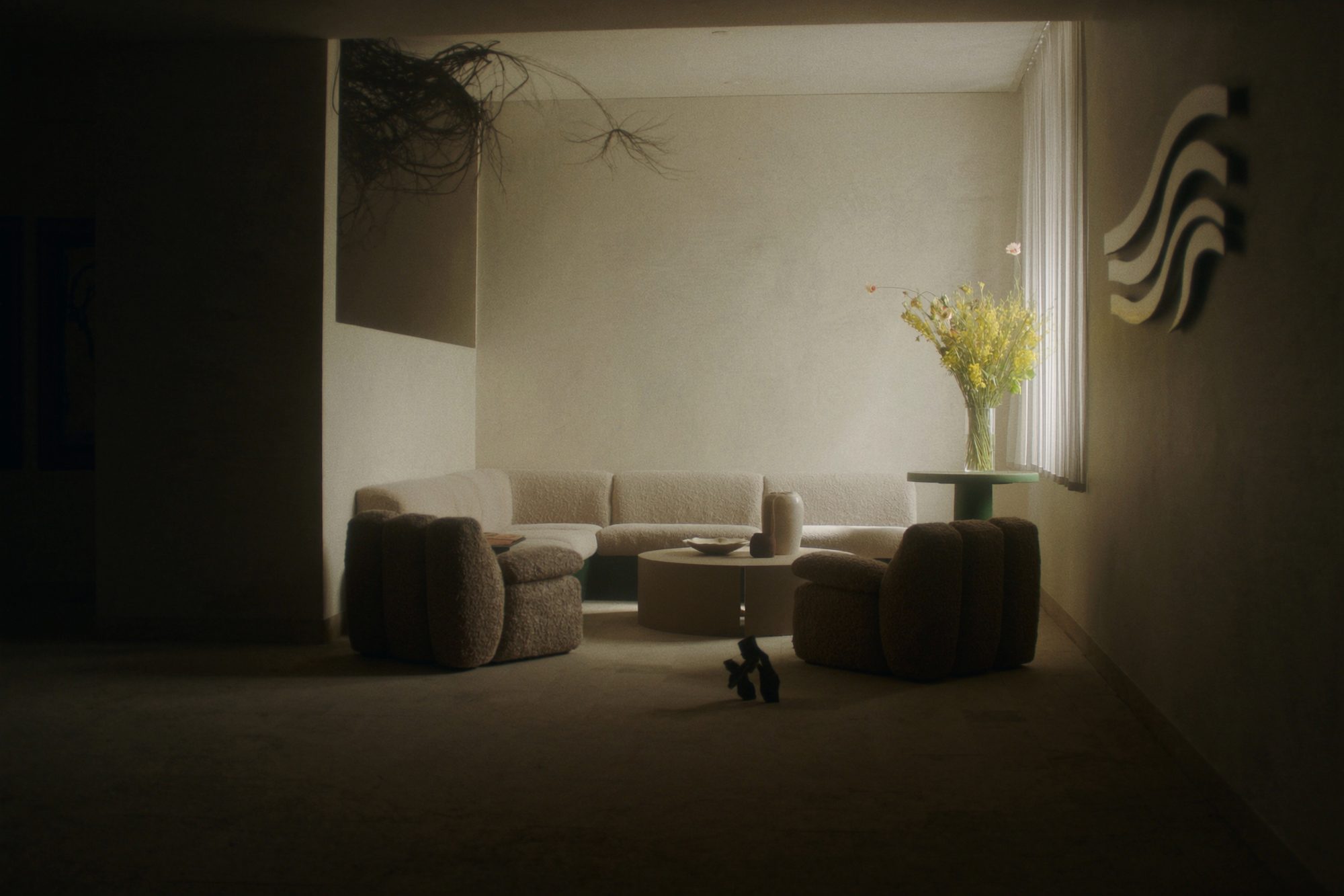 Office lounge with a linen sofa and bouclé armchairs